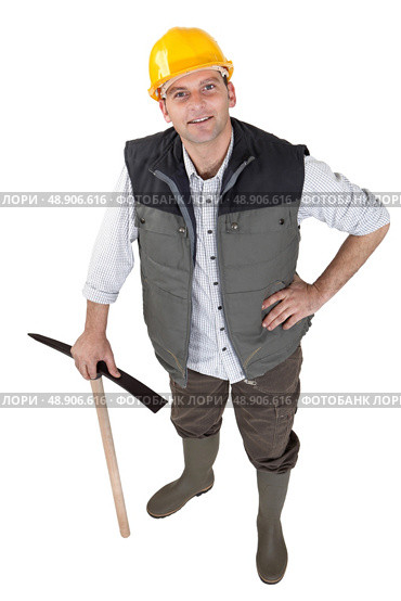 Man stood posing with pick axe. Стоковое фото, агентство Ingram Publishing / Фотобанк Лори