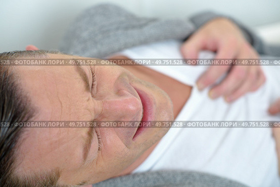 man stress heart attack illness burnout anxiety. Стоковое фото, агентство Ingram Publishing / Фотобанк Лори