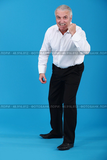 Man with a can-do attitude. Стоковое фото, агентство Ingram Publishing / Фотобанк Лори
