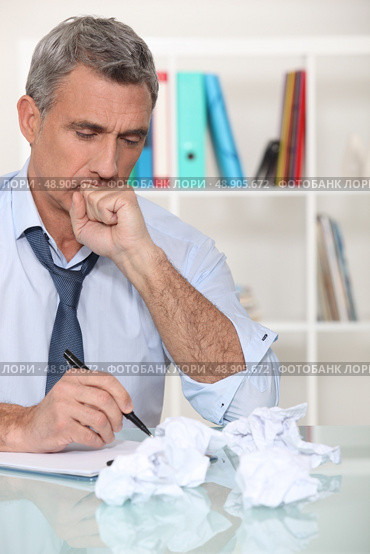 Man with writer’s block. Стоковое фото, агентство Ingram Publishing / Фотобанк Лори