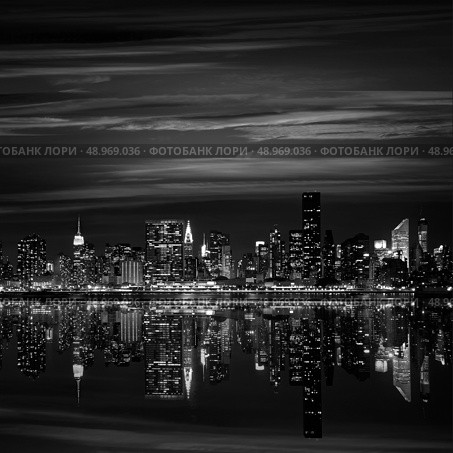 Manhattan New York skyline at sunset dusk from East River NYC USA. Стоковое фото, агентство Ingram Publishing / Фотобанк Лори