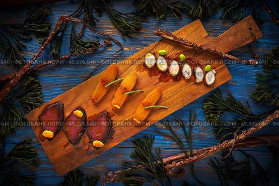 Marinated tuna roe and octopus salted smoked Mediterranean style with seaweed. Стоковое фото, агентство Ingram Publishing / Фотобанк Лори