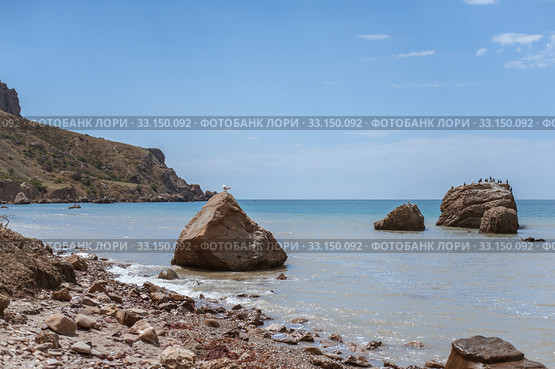 Meganom mountain range and beach, as well as the peninsula and cape in southeastern Crimea (2016 год). Стоковое фото, фотограф katalinks / Фотобанк Лори