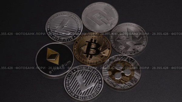 Metal coins of crypto currency LTC, ETH, BTC, XMR, XRP, DASH, on a dark background. Stop motion. Slow motion. 1080p Full HD video. Стоковое видео, видеограф Ярослав Данильченко / Фотобанк Лори