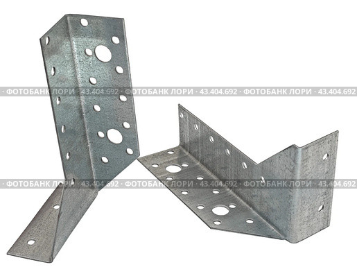 Металлический крепежный угольник на белом фоне. Metallic angle fixator on white background. Стоковое фото, фотограф Татьяна Д / Фотобанк Лори