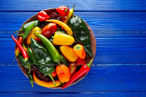 Mexican hot chili peppers colorful mix habanero poblano serrano jalapeno sweet. Стоковое фото, агентство Ingram Publishing / Фотобанк Лори