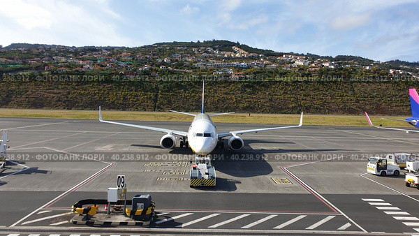 Международный аэропорт Мадейры имени Криштиану Роналду (Madeira Airport). Санта-Круш, Мадейра, Португалия (2023 год). Редакционное фото, фотограф lana1501 / Фотобанк Лори