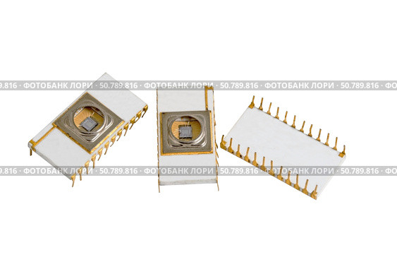 Микросхемы памяти с возможностью стирания информации УФ светом. Components for computer and Several electric chips. The photo on the white background. Стоковое фото, фотограф Татьяна Д / Фотобанк Лори