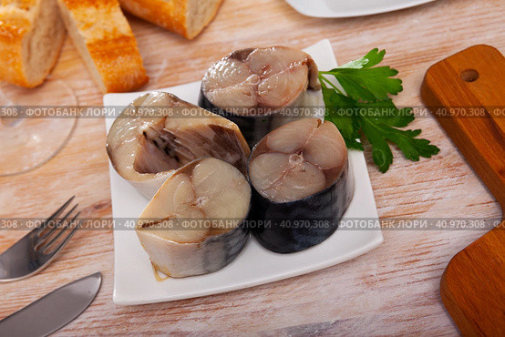 Mild-cured scomber with baguette on plate. Стоковое фото, фотограф Яков Филимонов / Фотобанк Лори