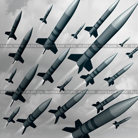 Missile weapon attack as a nuke or nuclear war threat concept as a group of ballistic bombs being launched for destruction as a 3D illustration concept. Стоковое фото, агентство Ingram Publishing / Фотобанк Лори