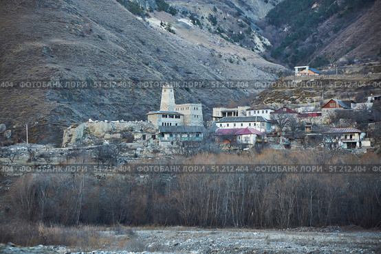 Mizur, Russia. - January 06, 2024: A village in North Ossetia on the way to the Tsey ski resort. Редакционное фото, фотограф Наталия Кирсанова / Фотобанк Лори