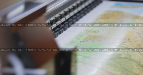 Modern Digital Large format UV printer. Printing production technologies. UV pinning is the process of applying a dose of low intensity ultraviolet light to a UV curable ink. Стоковое видео, видеограф Андрей Армягов / Фотобанк Лори