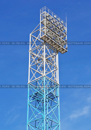 Мощные LED прожекторы на столбе на белом фоне. Powerful LED floodlights on a pole on a white background. Стоковое фото, фотограф Татьяна Д / Фотобанк Лори