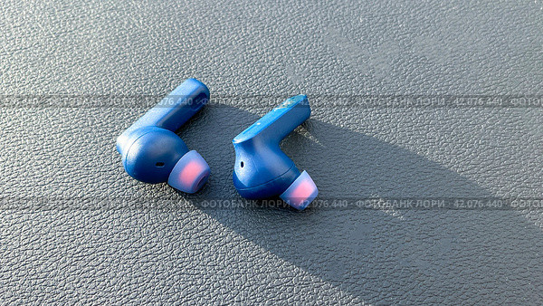 Moscow January 20 2024, JBL Wireless Earbuds. JBL Blue color Tune 230NC TWS Bluetooth wireless earphones\earbuds. Редакционное фото, фотограф Скрипачев Антон / Фотобанк Лори
