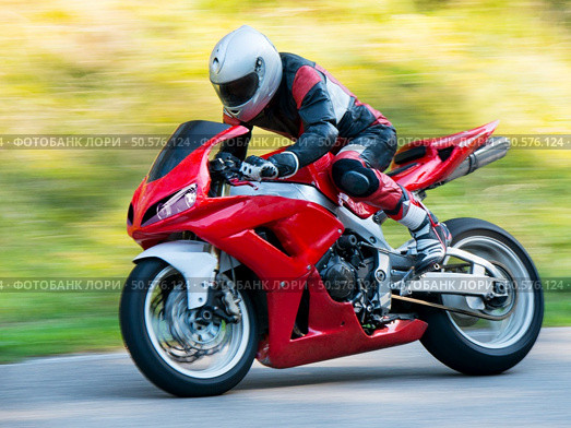 Motorbike racing. Стоковое фото, агентство Ingram Publishing / Фотобанк Лори