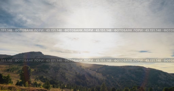 Mountain lake time lapse in summer or autumn. Wild nature and beautiful sunset. Moving clouds, deep twilight and dramatic sky. Стоковое видео, видеограф Александр Маркин / Фотобанк Лори