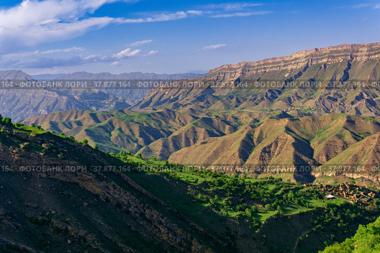 Mountain landscape, a huge canyon with an abandoned farm Kurib on one of the ledges, view towards Gunib and the plateau of Gunib. Стоковое фото, фотограф Евгений Харитонов / Фотобанк Лори