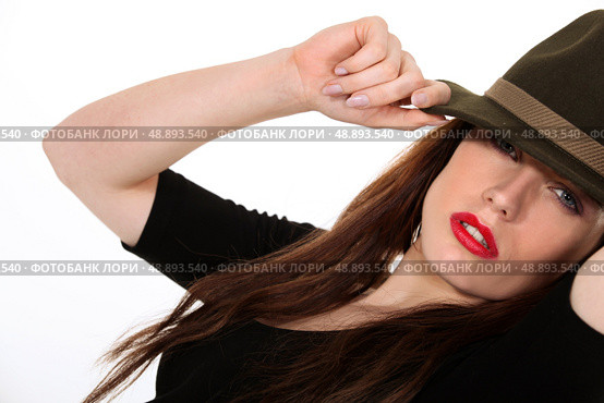 Mysterious woman wearing a Fedora hat. Стоковое фото, агентство Ingram Publishing / Фотобанк Лори
