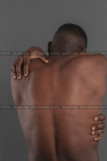 naked man looking down from shot. Стоковое фото, агентство Ingram Publishing / Фотобанк Лори