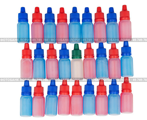 Несколько флаконов для инъекций на белом фоне. Several vials for injection on a white background. Стоковое фото, фотограф Татьяна Д / Фотобанк Лори