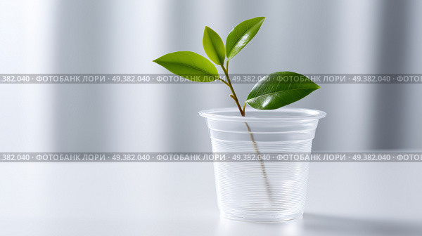New plant growth in a clear cup capturing nature's resilience indoors. Новый рост растений в прозрачной чаше, отражающий жизнестойкость природы в помещении. Стоковое AI-изображение, AI-художник Katsiaryna Repich / Фотобанк Лори