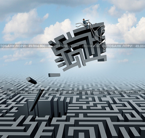New thinking and empowerment concept as a businessman riding a chunk of a maze or labyrinth as a business or life success concept and solution symbol for finding the answer. Стоковое фото, агентство Ingram Publishing / Фотобанк Лори