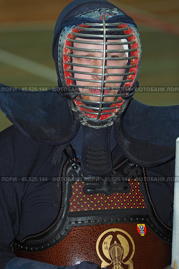 Nizhny Novgorod, Russia, 11.24.2024 Gagarin Avenue 25 d Russian Kendo Championship. Athletes in protective equipment with a sword and a protective helmet at competitions. Редакционное фото, фотограф Egor Sarantstv / Фотобанк Лори
