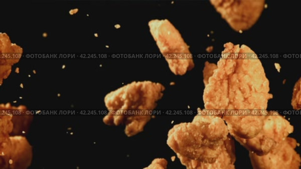 Nuggets fly up and fall down. Filmed is slow motion 1000 fps. Стоковое видео, видеограф Артем Шадрин / Фотобанк Лори