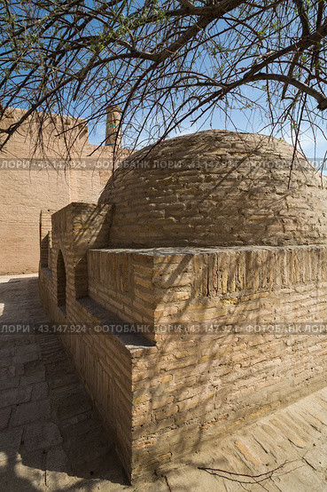 Old houses in Itchan Kala, the walled inner town of the city of Khiva. Стоковое фото, фотограф Юлия Белоусова / Фотобанк Лори
