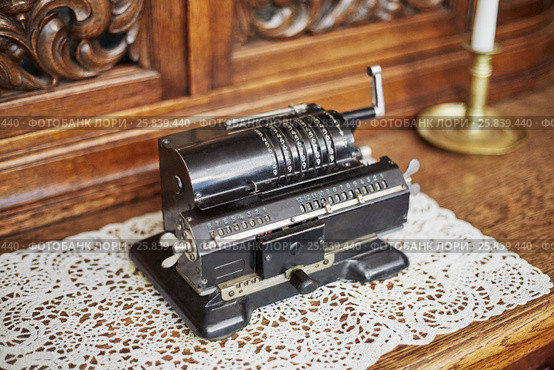 Old mechanical manual counting machine for arithmetical calculations. Стоковое фото, фотограф Losevsky Pavel / Фотобанк Лори