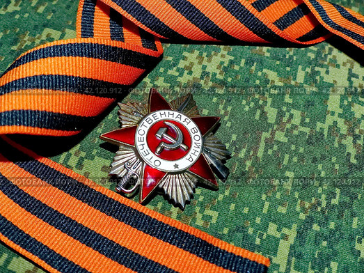 Орден «Отечественной войны» и георгиевская лента. Награда фронтовика. Семейная реликвия. Память. 9 мая День Победы. Стоковое фото, фотограф Сергей Елизарьев / Фотобанк Лори