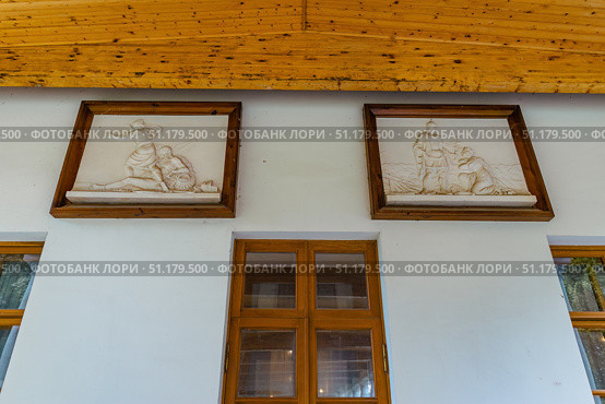 Ostafyevo Estate. Bas-relief on the wall of the manor. The former country estate of the Vyazemsky-Sheremetevs in the village of Ostafyevo. Редакционное фото, фотограф Константин Григорьев / Фотобанк Лори
