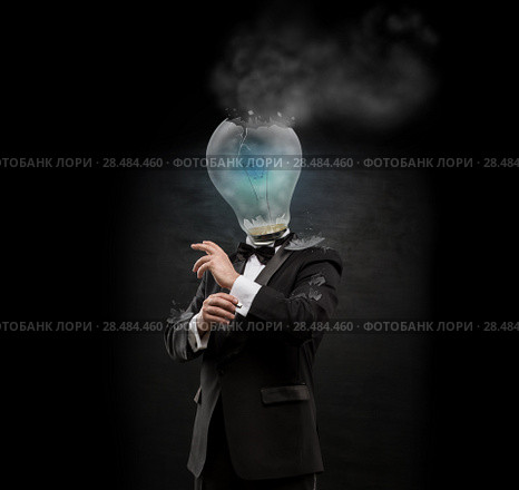 Overworked burnout business man standing headless with exploded bulb instead of his head. Strong stress concept. Стоковое фото, фотограф Kirill Kedrinskiy / Ingram Publishing / Фотобанк Лори