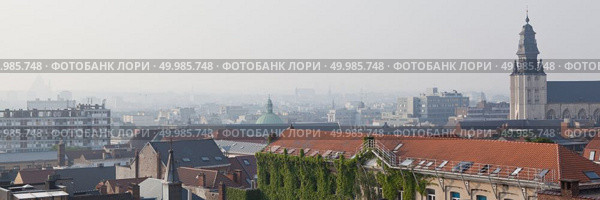 Panoramic view from above of the tower, on the city and roofs of Brussels, Belgium. view from above the top of tower. Стоковое фото, агентство Ingram Publishing / Фотобанк Лори