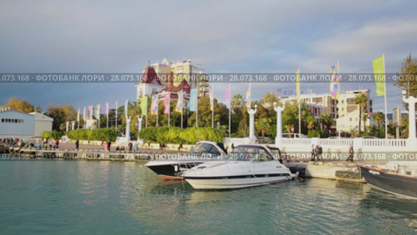 Panoramic view of Sochi sea port, sunset, calm sea (2017 год). Стоковое видео, видеограф Ирина Мойсеева / Фотобанк Лори