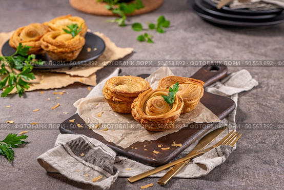 Pastries filled with meat, traditionally baked in black clay molds both from the region on Vila Real, Portugal. Стоковое фото, агентство Ingram Publishing / Фотобанк Лори