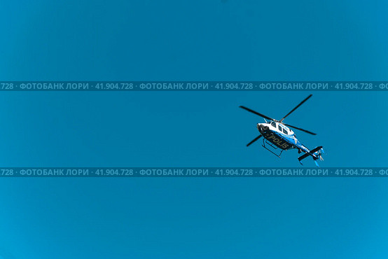 Patrol police helicopter in the sky of Antalya. Turkey. Antalya 05.01.2023. Редакционное фото, фотограф Ярославский Максим / Фотобанк Лори