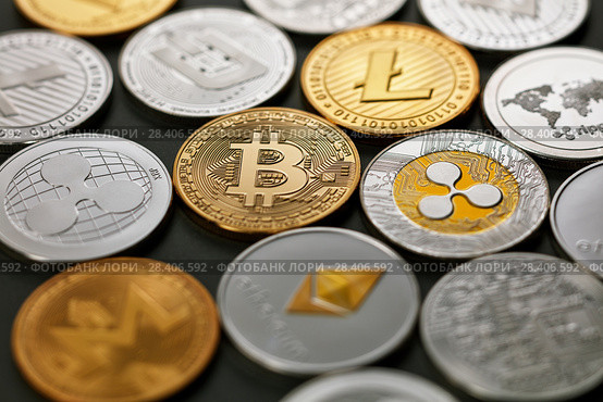 Pattern of coins LTC, ETH, BTC, XMR, XRP on a dark background. Business concept. Стоковое фото, фотограф Ярослав Данильченко / Фотобанк Лори