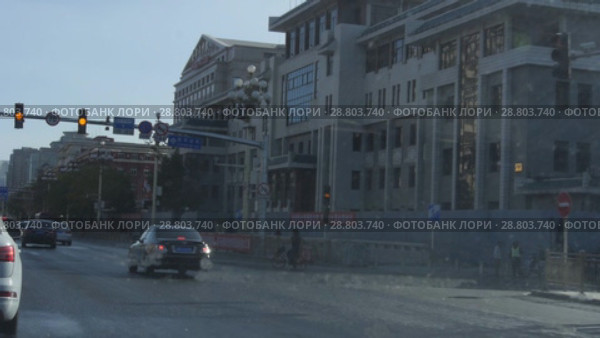Пекин. Движение на улицах. Beijing. Traffic during the day. Streets of the city. (2018 год). Стоковое видео, видеограф Евгений Романов / Фотобанк Лори