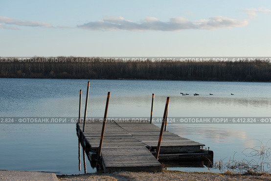 Pier in a lake, Manitoba, Canada. Стоковое фото, агентство Ingram Publishing / Фотобанк Лори