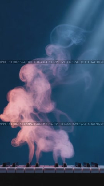 Pink and blue smoke rising from piano keys. Стоковое AI-видео, аниматор Юрий Поздников / Фотобанк Лори