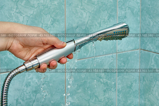Plastic shower head is leaking and cannot be repaired. Стоковое фото, фотограф Владимир Григорьев / Фотобанк Лори