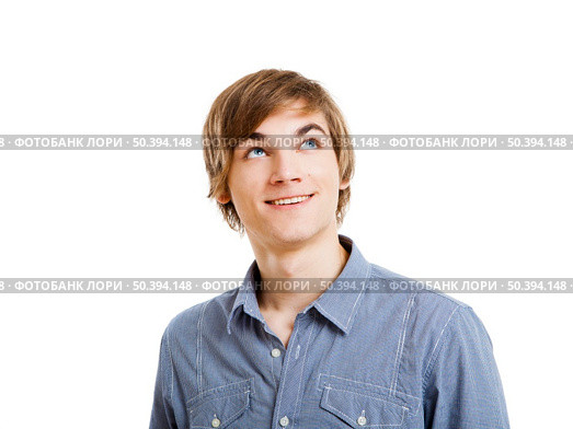 Portrait of a happy young man looking and thinking. isolated over a white background. Стоковое фото, агентство Ingram Publishing / Фотобанк Лори