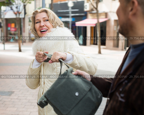 Portrait of adult woman and robber. Стоковое фото, фотограф Яков Филимонов / Фотобанк Лори