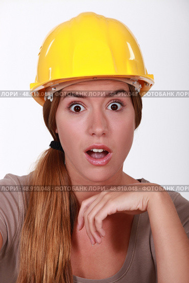 Portrait of an astonished tradeswoman. Стоковое фото, агентство Ingram Publishing / Фотобанк Лори
