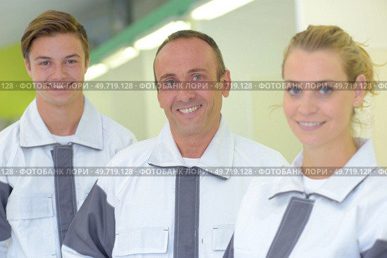Portrait of three manual workers. Стоковое фото, агентство Ingram Publishing / Фотобанк Лори