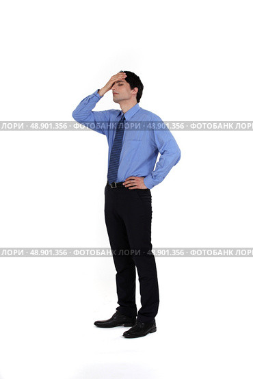 portrait of young businessman having remorse. Стоковое фото, агентство Ingram Publishing / Фотобанк Лори