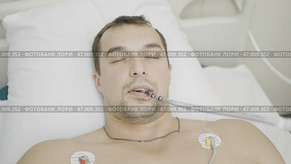 Postoperative period, coma, complications after surgery. Стоковое фото, фотограф David Kashakhi / Фотобанк Лори