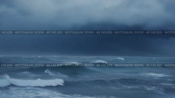 Powerful ocean storm with crashing waves and distant lightning — ideal for climate change, natural disasters, or dramatic weather visuals. Стоковое видео, видеограф Башкирова Анна / Фотобанк Лори