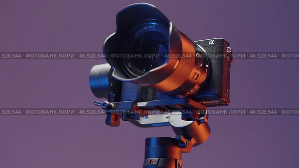 Professional camera on electric stabilizer with automatic control modes. Редакционное фото, фотограф David Kashakhi / Фотобанк Лори